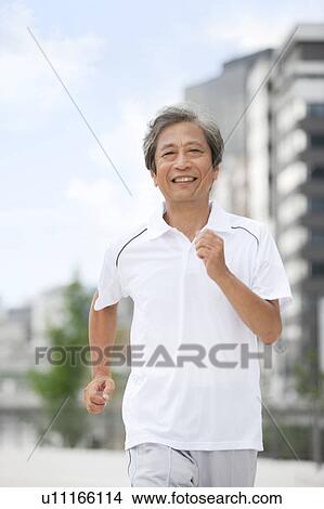 Picture - Mature Man Jogging. Fotosearch