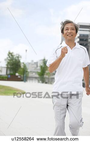 Picture - Mature Man Jogging. Fotosearch