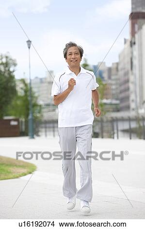 Picture - Mature Man Jogging. Fotosearch