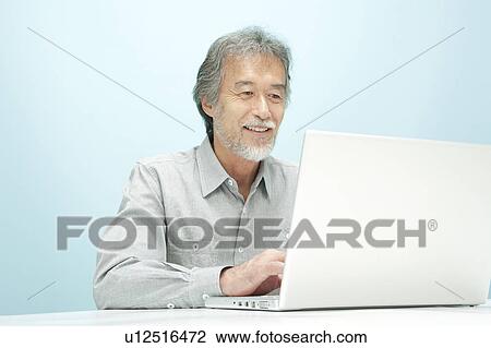 Mature Man Using Laptop View Large Photo Image Stock Image - Mature Man Using Laptop. Fotosearch