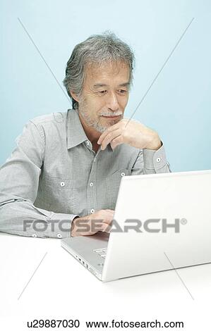 Mature Man Using Laptop View Large Photo Image Stock Image - Mature Man Using Laptop. Fotosearch