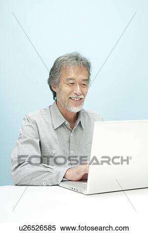 Mature Man Using Laptop View Large Photo Image Stock Photography - Mature Man Using Laptop. Fotosearch