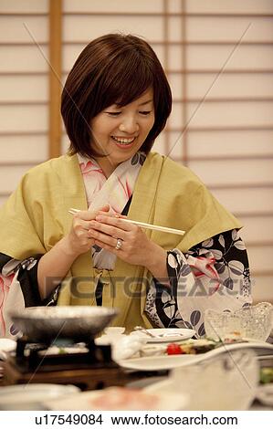 Mature Woman Having Dinner View Large Photo Image Picture - Mature Woman Having Dinner. Fotosearch
