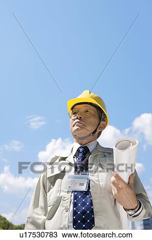 Middle-aged Man Wearing Hardhat View Large Photo Image Stock Image - Middle-aged Man Wearing Hardhat. Fotosearch