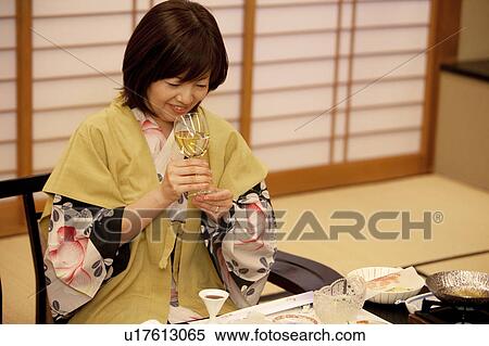 Middle-aged Woman Having White Wine View Large Photo Image Stock Photography - Middle-aged Woman Having White Wine. Fotosearch