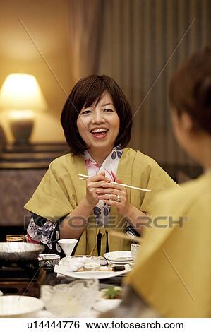 Mother and Daughter Having Dinner, Mother Talking View Large Photo Image Stock Photograph - Mother and Daughter Having Dinner, Mother Talking. Fotosearch