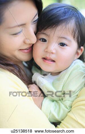 Mother Hugging Daughter View Large Photo Image Stock Photo - Mother Hugging Daughter. Fotosearch