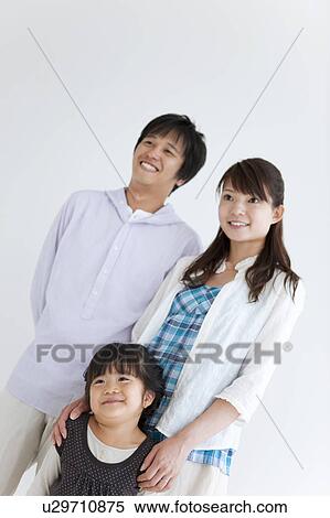 Stock Photography - Parents and Daughter. Fotosearch