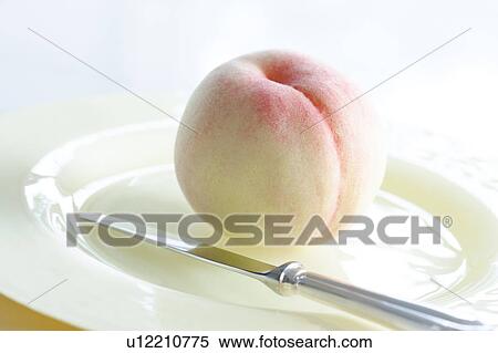 Peach on plate View Large Photo Image Stock Photography - Peach on plate. Fotosearch