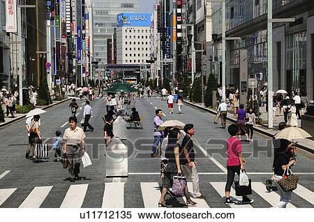 Stock Photography - Pedestrians Crossing Street. Fotosearch
