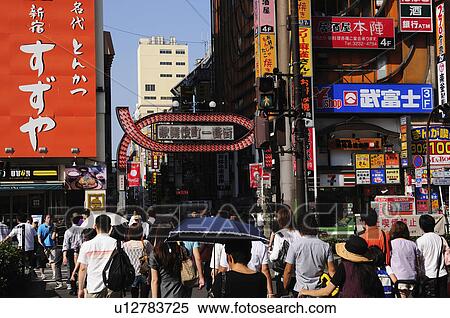 Stock Photography - Pedestrians in Kabuki-cho. Fotosearch