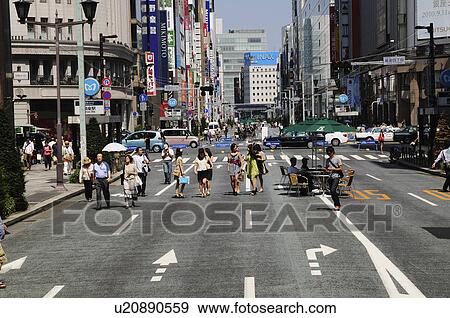 Stock Photo - People Walking on Street. Fotosearch