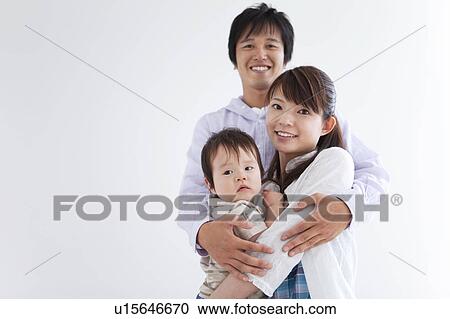 Stock Image - Portrait of Father, Mother and Son. Fotosearch