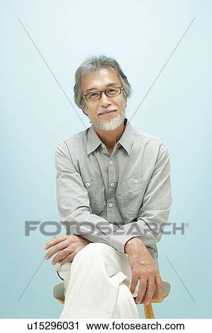 Stock Image - Portrait of Mature Man with Grey Hair. Fotosearch