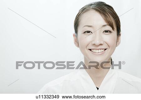 Portrait of woman wearing Kyudo (Japanese art of archery) uniform, Tokyo Prefecture, Japan View Large Photo Image Stock Photo - Portrait of woman wearing Kyudo (Japanese art of archery) uniform, Tokyo Prefecture, Japan. Fotosearch