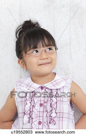 Portrait of Young Girl with Glasses View Large Photo Image Stock Image - Portrait of Young Girl with Glasses. Fotosearch