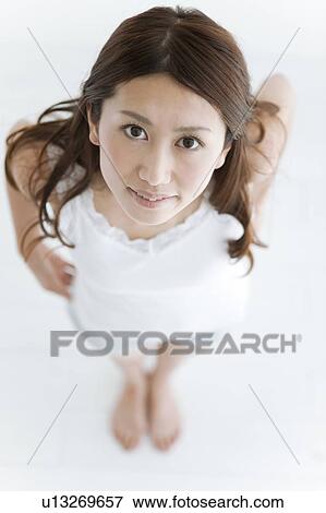 Portrait of Young Woman, High Angle View View Large Photo Image Stock Photo - Portrait of Young Woman, High Angle View. Fotosearch