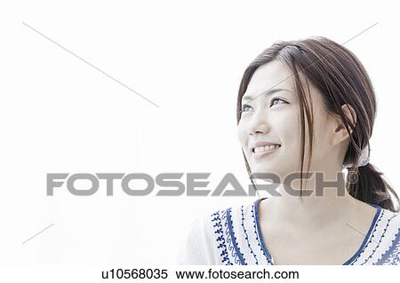 Stock Photography - Profile of young woman, Tokyo Prefecture, Honshu, Japan. Fotosearch