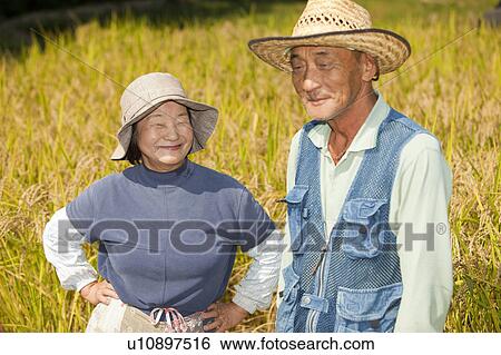 Senior Couple in Rice Field View Large Photo Image Stock Photograph - Senior Couple in Rice Field. Fotosearch