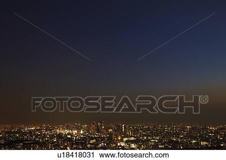 Stock Image - Shinjuku at Night, Seen From Ikebukuro. Fotosearch