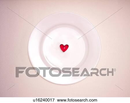 Stock Photo - Single Heart Shaped Sweet on Plate. Fotosearch