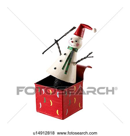 Stock Photo - Snowman Emerging From Christmas Present. Fotosearch