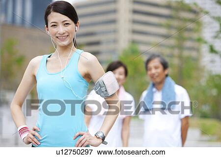 Sporty Family, Daughter in Foreground View Large Photo Image Stock Photo - Sporty Family, Daughter in Foreground. Fotosearch