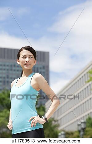Sporty Young Woman with Hands On Hips View Large Photo Image Stock Image - Sporty Young Woman with Hands On Hips. Fotosearch