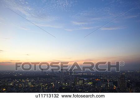 Stock Image - Sunset Over Shibuya, Seen From Roppongi. Fotosearch