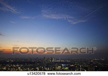 Stock Photo - Sunset Over Shibuya, Seen From Roppongi. Fotosearch