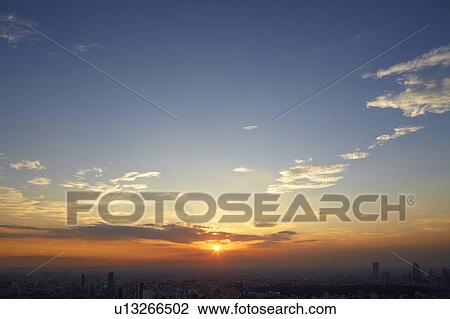 Stock Image - Sunset Over Shinjuku, Seen From Roppongi. Fotosearch