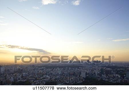 Stock Photo - Sunset Over Shinjuku Seen From Roppongi. Fotosearch
