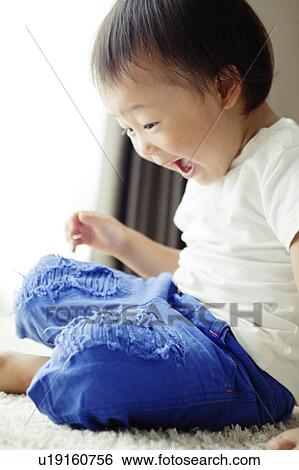 Stock Photograph - Surprised Baby Boy. Fotosearch