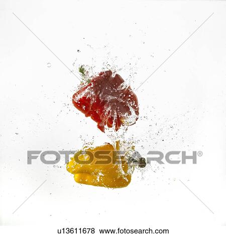 Two Bell Peppers Falling Into Water View Large Photo Image Stock Photo - Two Bell Peppers Falling Into Water. Fotosearch