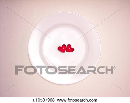 Two Heart Shape Sweets on Plate View Large Photo Image Stock Photo - Two Heart Shape Sweets on Plate. Fotosearch