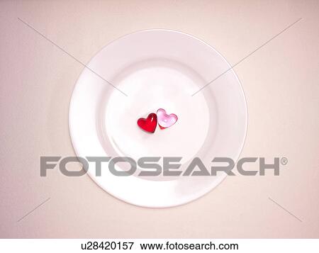 Two Heart Shape Sweets on Plate View Large Photo Image Stock Photo - Two Heart Shape Sweets on Plate. Fotosearch