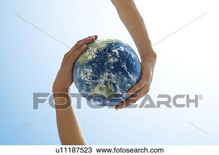 Two People Holding Globe View Large Photo Image Stock Image - Two People Holding Globe. Fotosearch