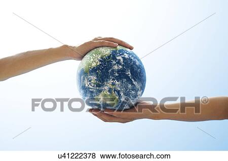 Two People Holding Globe View Large Photo Image Stock Photo - Two People Holding Globe. Fotosearch
