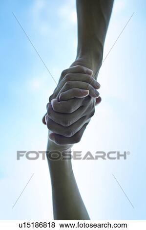 Two People Shaking Hands View Large Photo Image Stock Photo - Two People Shaking Hands. Fotosearch
