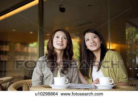 Two Young Women Having Coffee View Large Photo Image Picture - Two Young Women Having Coffee. Fotosearch