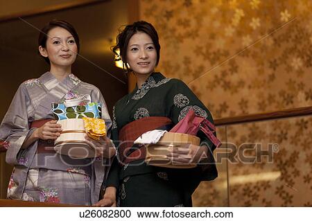 Stock Image - Two Young Women in Spa. Fotosearch
