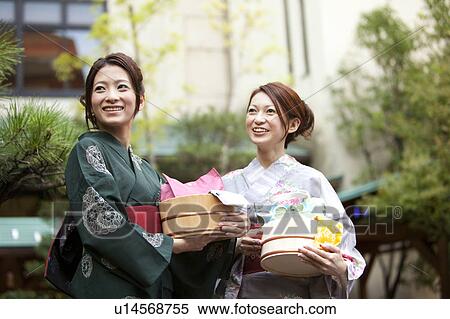 Two Young Women in Spa View Large Photo Image Stock Photography - Two Young Women in Spa. Fotosearch