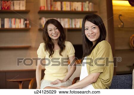 Two Young Women View Large Photo Image Stock Photo - Two Young Women. Fotosearch
