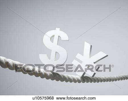 US and Yen Signs on Rope View Large Photo Image Stock Photo - US and Yen Signs on Rope. Fotosearch