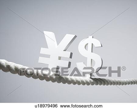 US and Yen Signs on Rope View Large Photo Image Stock Photograph - US and Yen Signs on Rope. Fotosearch