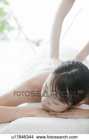 Woman getting a massage, Tokyo Prefecture, Japan View Large Photo Image Picture - Woman getting a massage, Tokyo Prefecture, Japan. Fotosearch
