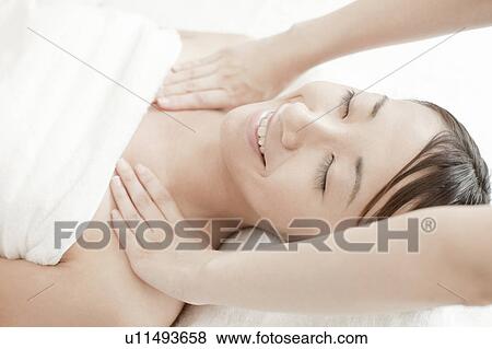 Woman getting a massage, Tokyo Prefecture, Japan View Large Photo Image Stock Photo - Woman getting a massage, Tokyo Prefecture, Japan. Fotosearch