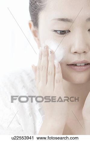 Woman washing her face, Tokyo Prefecture, Honshu, Japan View Large Photo Image Stock Image - Woman washing her face, Tokyo Prefecture, Honshu, Japan. Fotosearch