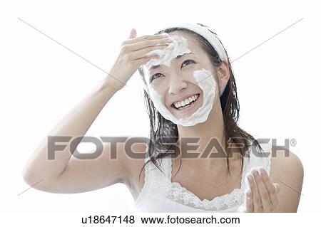 Woman washing her face, Tokyo Prefecture, Japan View Large Photo Image Stock Photo - Woman washing her face, Tokyo Prefecture, Japan. Fotosearch