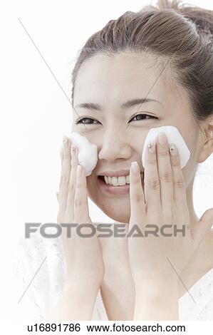 Woman washing her face, Tokyo Prefecture, Honshu, Japan View Large Photo Image Stock Photograph - Woman washing her face, Tokyo Prefecture, Honshu, Japan. Fotosearch